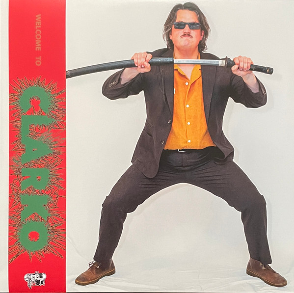 Clarko - Welcome To Clarko (Mustard Yellow Vinyl) [Vinyl] | Iron Lung Records (LUNGS-230)