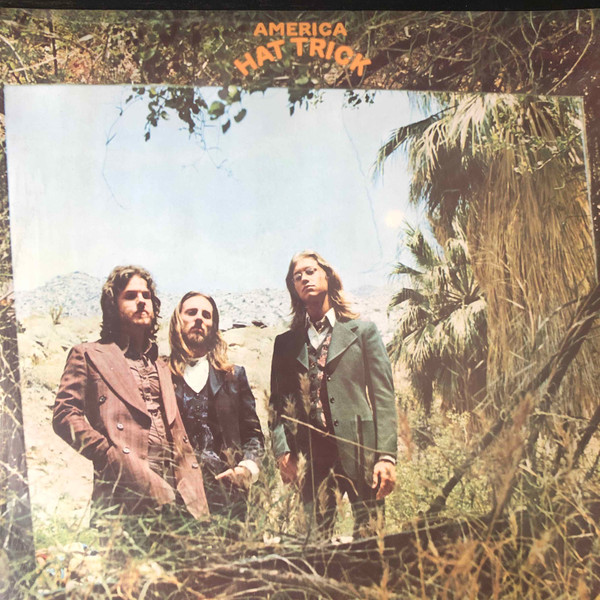 America - Hat Trick | Warner Bros. Records (W 56016) - main America - Hat Trick | Warner Bros. Records (W 56016) - main