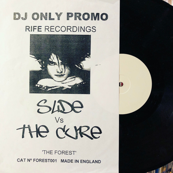 Slide vs. The Cure - The Forest | Not On Label (FOREST-1) - main