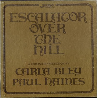 Carla Bley , Paul Haines - Escalator Over The Hill | JCOA Records (3LP-EOTH) - main Carla Bley , Paul Haines - Escalator Over The Hill | JCOA Records (3LP-EOTH) - main