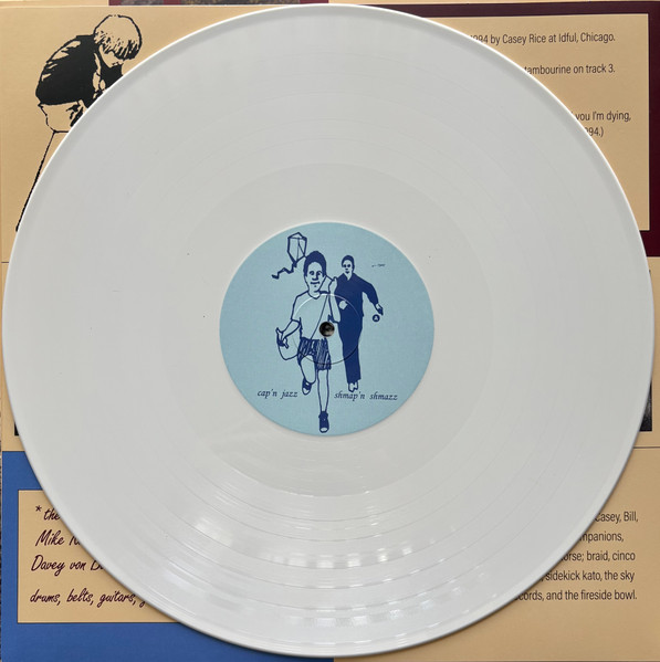 Cap'n Jazz - Burritos, Inspiration Point, Fork Balloon Sports, Cards In The Spokes, Automatic Biographies, Kites, Kung Fu, Trophies, Banana Peels We've Slipped On, And Egg Shells We've Tippy Toed Over (Shmap'n Shmazz) | Polyvinyl Record Company (PRC-502) - 3