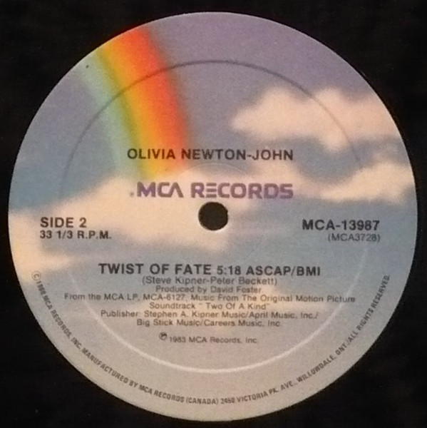 Olivia Newton-John - Livin' In Desperate Times / Twist Of Fate | MCA Records (Canada) (MCA-13987)