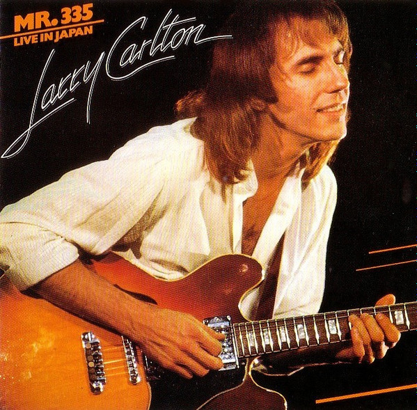 Larry Carlton = Larry Carlton - Mr. 335 - Live In Japan = ライヴ・イン・ジャパン | Warner Bros. Records (WPCP-4092) - 2