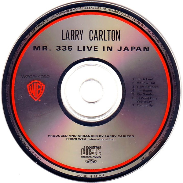 Larry Carlton = Larry Carlton - Mr. 335 - Live In Japan = ライヴ・イン・ジャパン | Warner Bros. Records (WPCP-4092) - 4