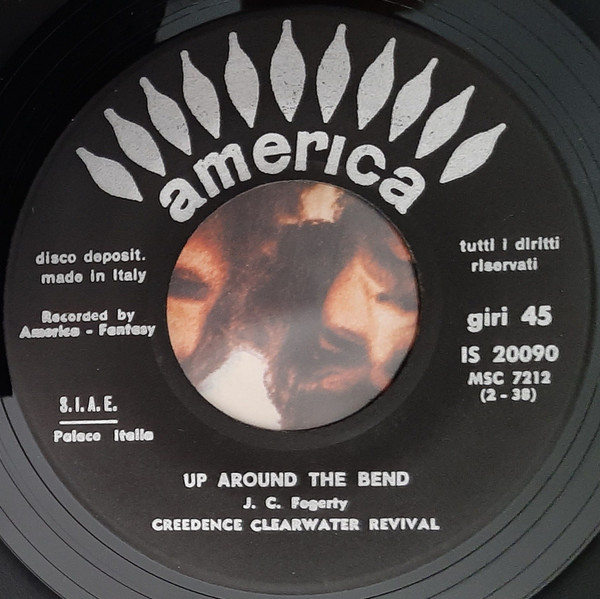 Creedence Clearwater Revival - Run Through The Jungle / Up Around The Bend | America Records (IS 20090) - 2