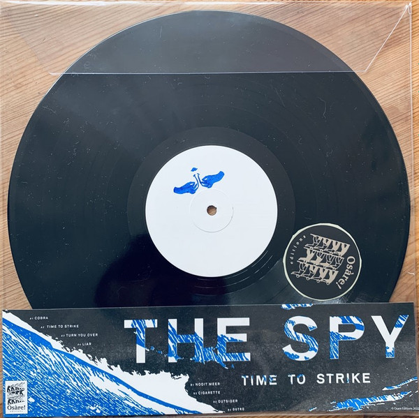 The Spy - Time To Strike | Osàre! Editions (OE 014) - main The Spy - Time To Strike | Osàre! Editions (OE 014) - main