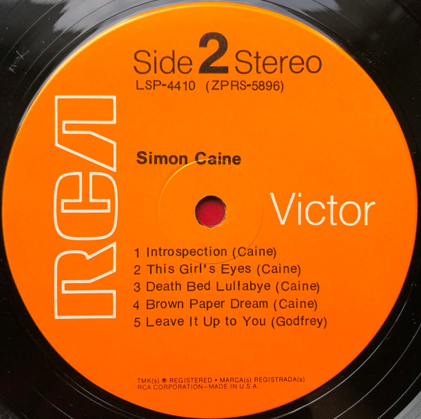 Simon Caine