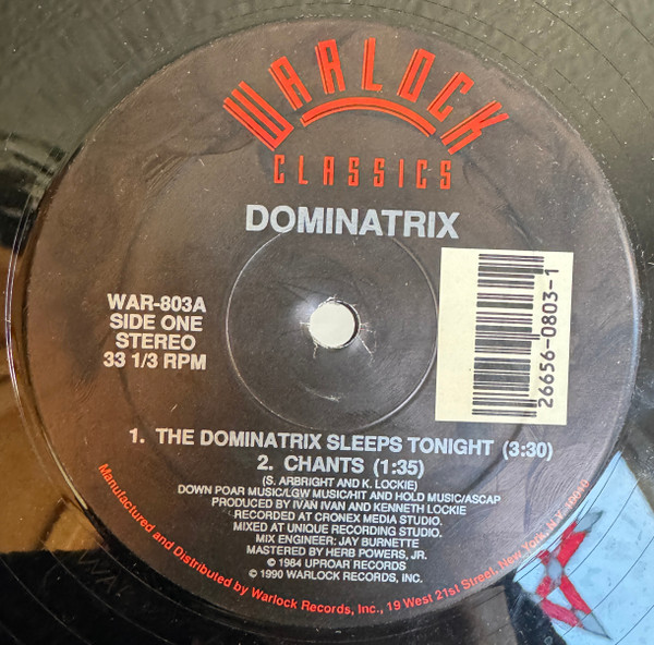 Dominatrix - The Dominatrix Sleeps Tonight | Warlock Records (WAR-803)