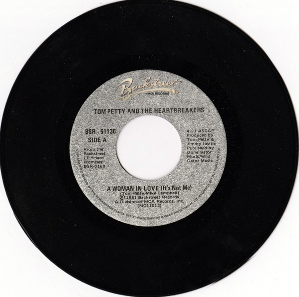 Tom Petty And The Heartbreakers - A Woman In Love (It's Not Me) / Gator On The Lawn (7") [Vinyl] | Backstreet Records (BSR-51136) - 2