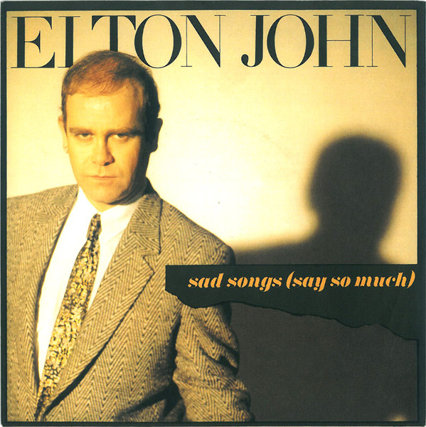 Elton John - Sad Songs (Say So Much) | The Rocket Record Company (822 087-7)
