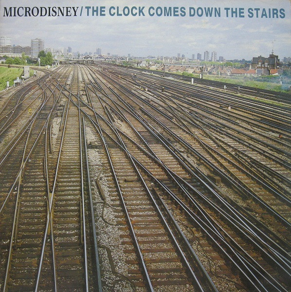 Microdisney - The Clock Comes Down The Stairs | Virgin (70419) - main