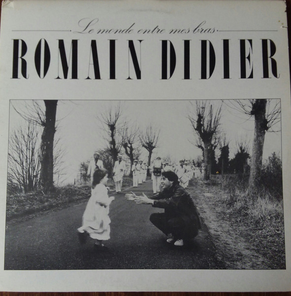 Romain Didier - Le Monde Entre Mes Bras | Les Éditions Du Champ De Mars (CDM 8001) - main Romain Didier - Le Monde Entre Mes Bras | Les Éditions Du Champ De Mars (CDM 8001) - main