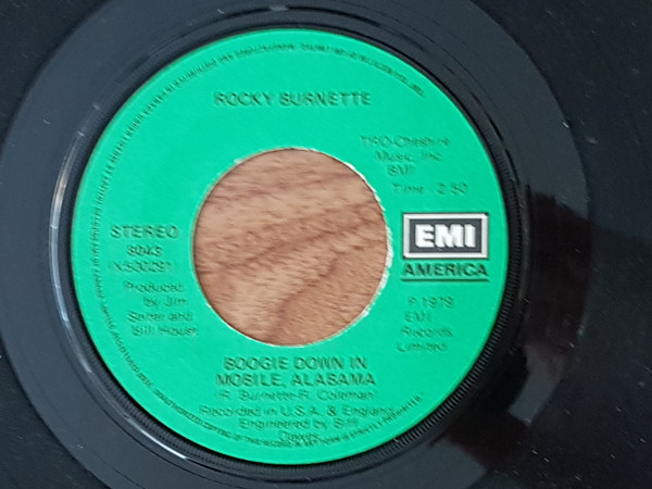 Rocky Burnette - Tired Of Toein' The Line / Boogie Down In Mobile, Alabama | EMI America (8043) - 2 Rocky Burnette - Tired Of Toein' The Line / Boogie Down In Mobile, Alabama | EMI America (8043) - 2