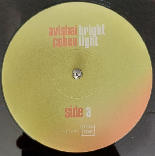 Avishai Cohen , Roni Kaspi , Guy Moskovich - Brightlight | Naïve (BLV8584) - 2 Avishai Cohen , Roni Kaspi , Guy Moskovich - Brightlight | Naïve (BLV8584) - 2
