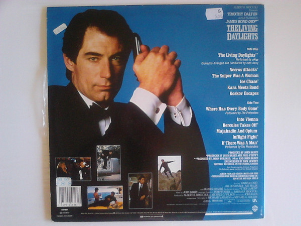 John Barry , Various - The Living Daylights (Original Motion Picture Soundtrack) | Warner Bros. Records (1591961) - 2 John Barry , Various - The Living Daylights (Original Motion Picture Soundtrack) | Warner Bros. Records (1591961) - 2